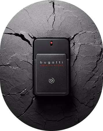 Schwarzes bugatti Parfum auf zerbrochener schwarzer Oberfläche